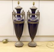 A pair of large Sevres style cobalt blue glazed ceramic lamps with bronzed mounts, 84cm total
