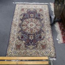 A North West Persian blue ground rug, 240 x 140cm***CONDITION REPORT***PLEASE NOTE:- Prospective