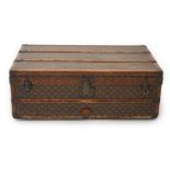 A vintage Louis Vuitton rectangular trunk, in monogram canvas with tan leather and brass mounted