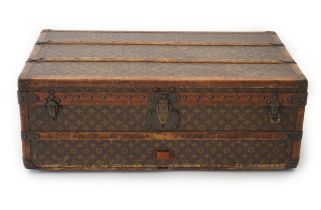 A vintage Louis Vuitton rectangular trunk, in monogram canvas with tan leather and brass mounted