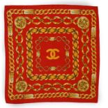 A Chanel Red Chain large silk scarf, in gold and red colours, 80cm x 80cm***CONDITION REPORT***