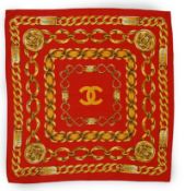 A Chanel Red Chain large silk scarf, in gold and red colours, 80cm x 80cm***CONDITION REPORT***