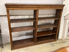 An Edwardian oak open bookcase, width 150cm, depth 28cm, height 122cm (adapted)***CONDITION