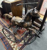 A Victorian style horse tricycle, height 84cm***CONDITION REPORT***PLEASE NOTE:- Prospective