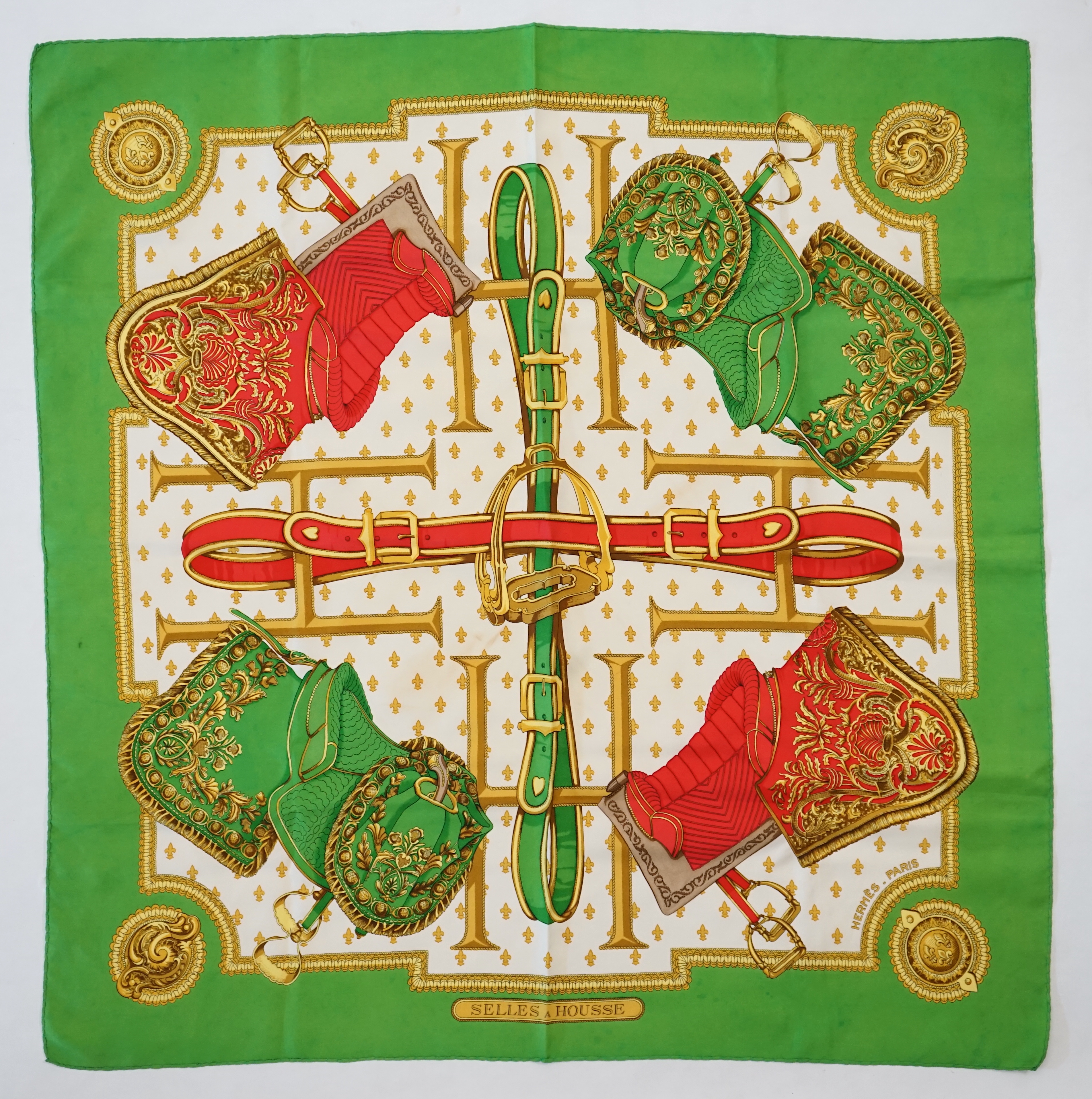 A Hermès silk Scarf "Selles a Housse" by Christiane Vauzelles, green/red/white/gold, with box, - Image 4 of 6