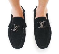 A pair of Louis Vuitton black suede Monte Carlo loafers, size 41, crafted from black suede and the