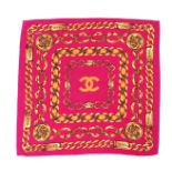 A Chanel Chain pink and gold silk scarf, 80cm x 80cm***CONDITION REPORT***Numerous scattered make up