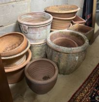 Fourteen assorted terracotta garden planters, largest diameter 42cm, height 40cm***CONDITION