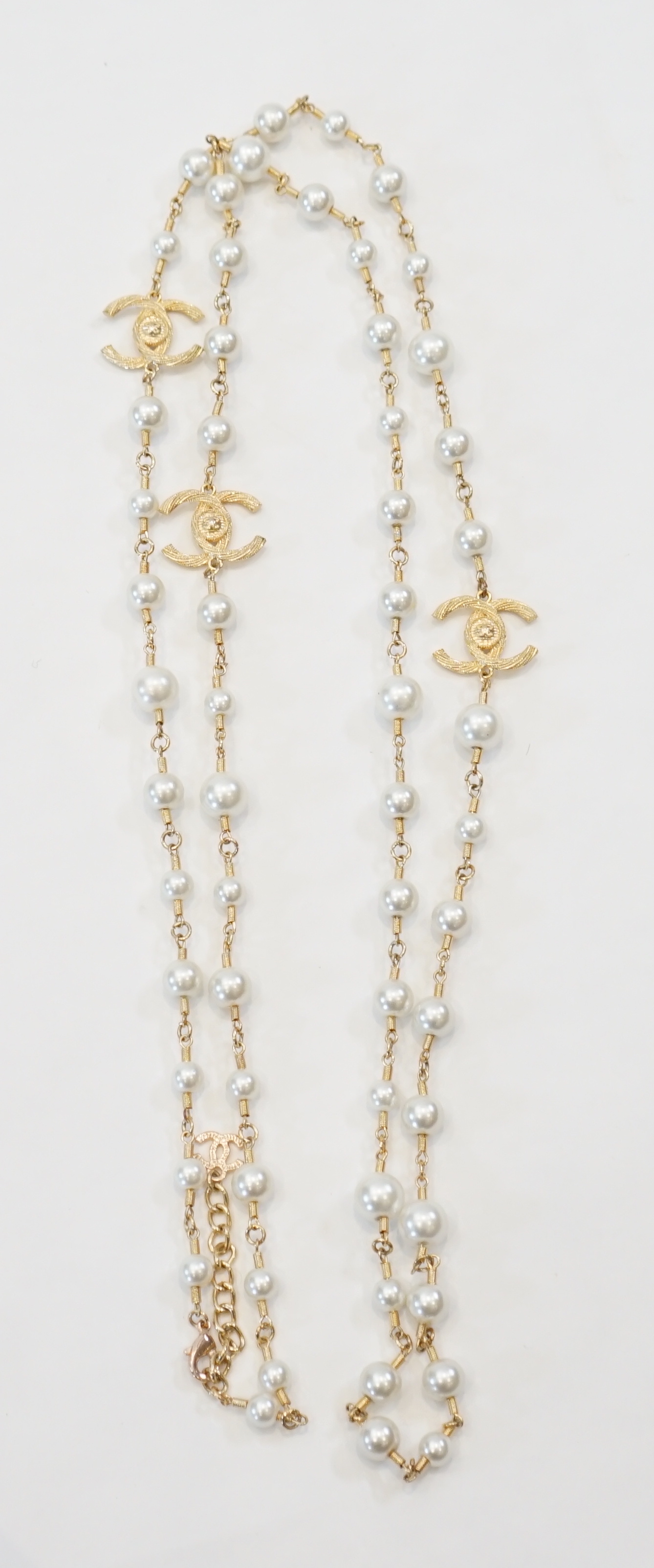 A Chanel gold plated 3 CC scatter pearl long necklace as seen in the film The Devil Wears Prada worn - Image 5 of 7