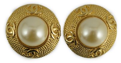 A pair of Vintage Chanel round CC logo button clip-on gold-tone / faux mabe pearl earrings,