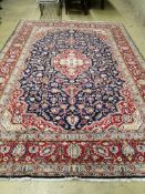 A Kashan blue ground carpet, 360 x 250cm***CONDITION REPORT***PLEASE NOTE:- Prospective buyers are