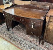 An Edwardian mahogany bow front kneehole washstand, width 122cm, depth 58cm, height 86cm***CONDITION