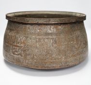 A large Islamic tinned copper bowl, inscribed in Kufic script, 38cm diameter***CONDITION REPORT***