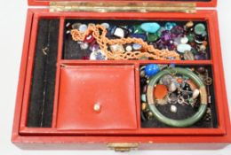 A box of assorted jewellery including loose stones, coral necklace, 9ct gold ring, a turquoise and