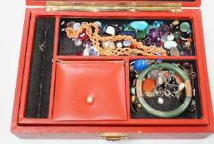 A box of assorted jewellery including loose stones, coral necklace, 9ct gold ring, a turquoise and