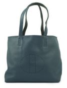 An Hermès Double Sens Tote in black/blue reversible leather with perforated H logo in a circle on
