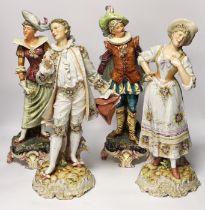 A pair of Volkstedt porcelain figures and a pair continental earthenware figures, 42cm***CONDITION