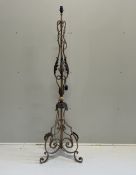 An early 20th century French wrought iron telescopic standard lamp***CONDITION REPORT***PLEASE