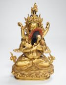 A Sino Tibetan gilt bronze group of a deity with consort, 22.5cm high***CONDITION REPORT***PLEASE