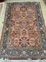 A North West Persian red ground rug, 220 x 137cm***CONDITION REPORT***PLEASE NOTE:- Prospective