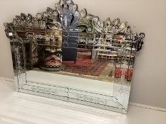 A Venetian style engraved glass overmantel mirror, width 150cm, height 115cm***CONDITION REPORT***
