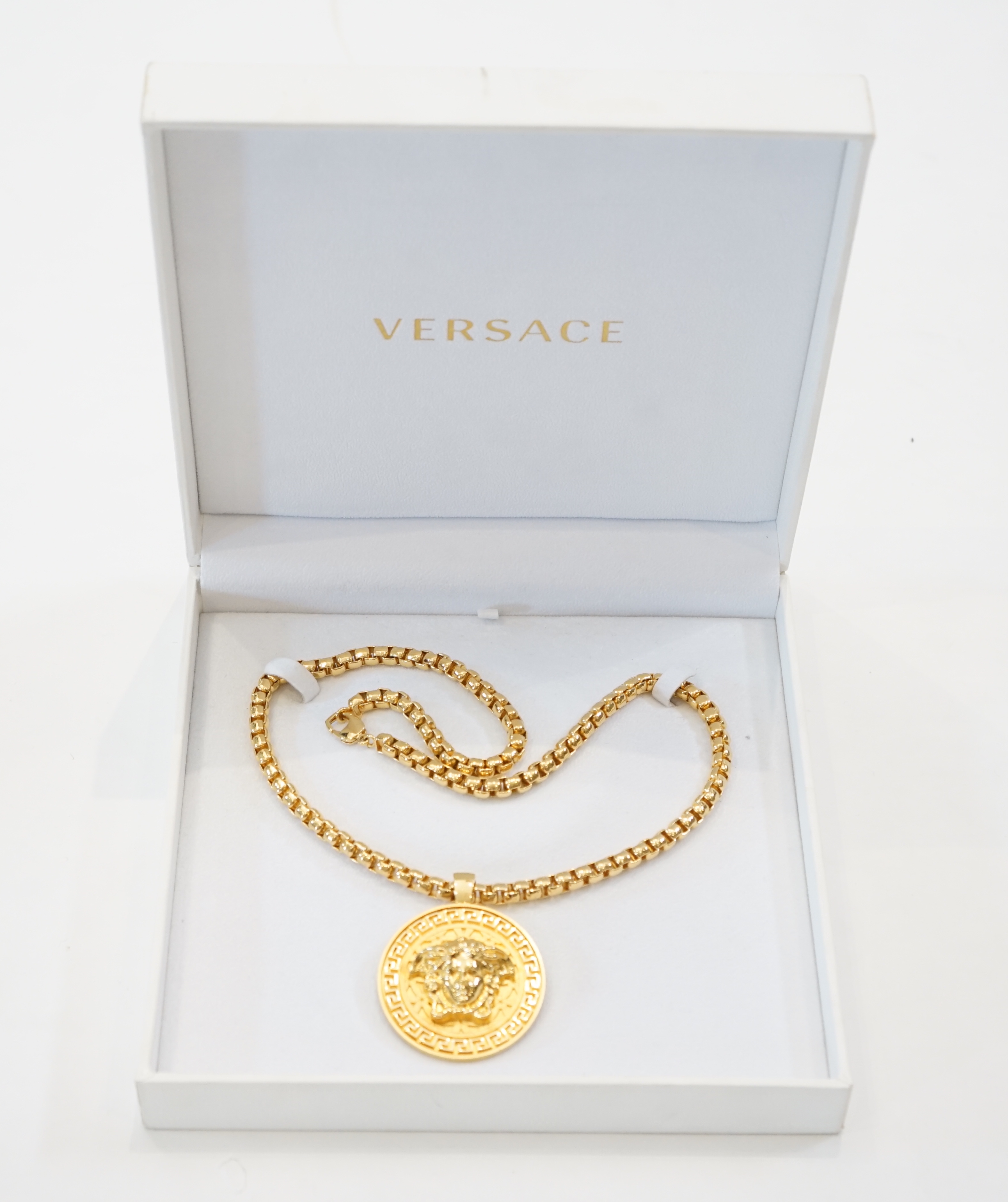 A Versace Medusa gold Greca medallion coin pendant with chunky rapper necklace, in original white - Image 4 of 7