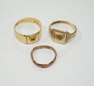 A 1930's 18ct gold signet ring (stone missing), 7.4 grams and two 9ct gold rings including diamond