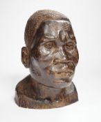 An African carved ebony bust of a gentleman, incised Silas to base, 24cm high***CONDITION REPORT***
