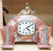 A French Art Deco figural clock garniture, in marble with gilded bronze figure, enamel face