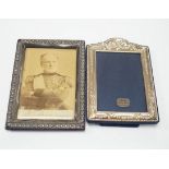 An Edwardian silver mounted photograph frame, Henry Matthews, Birmingham, 1904, 17.2cm and a