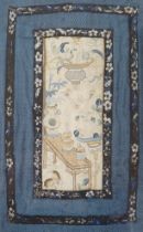 A Chinese silk embroidered panel or robe fragment, 34 x 22cm