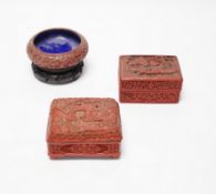 Two Chinese cinnabar lacquer boxes and a similar bowl on hardwood stand