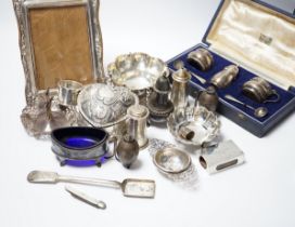 Sundry small silver including a repousse heart shaped trinket box, silver mounted photograph