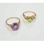 Two modern 14k and gem set dress rings, including amethyst, size P/Q, gross weight 6 grams.