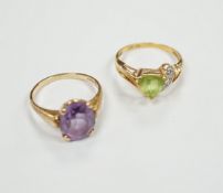 Two modern 14k and gem set dress rings, including amethyst, size P/Q, gross weight 6 grams.