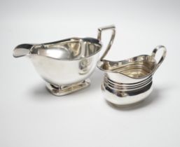 A George VI silver sauceboat, Birmingham, 1947 and a silver cream jug, marks rubbed, 10.5oz.