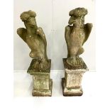 A pair of reconstituted stone models of eagles, on square plinths, height 125cm (eagle head