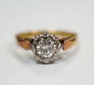 An 18ct, plat. and illusion set solitaire diamond ring, size J, gross weight 2.9 grams.