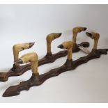A pair of taxidermy deer hoof gun racks, 63cm long