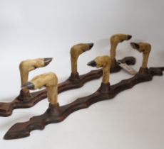 A pair of taxidermy deer hoof gun racks, 63cm long