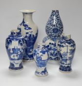 Five 19th century Chinese various sized blue and white figural vases, tallest double gourd vase 27cm