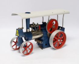A boxed Wilesco ‘Old Smoky’ live steam traction engine (D40) and two accessories; a circular saw (