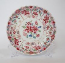 A Chinese famille rose moulded saucer dish, Yongzheng/Qianlong, 16cm diameter