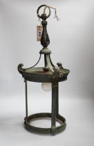 An early 20th century hanging hall lantern frame (glass missing), 57cm high