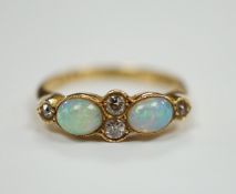 A George V 18ct gold, two stone white opal and four stone diamond chip set half hoop ring,