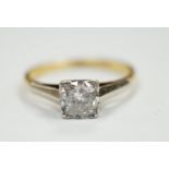 An 18ct, plat. and solitaire diamond ring, size O, gross weight 2.7 grams, the stone measuring 5.7mm