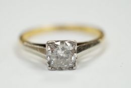 An 18ct, plat. and solitaire diamond ring, size O, gross weight 2.7 grams, the stone measuring 5.7mm
