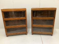 A pair of Globe Wernicke oak three section bookcases, width 85cm, depth 28cm, height 109cm