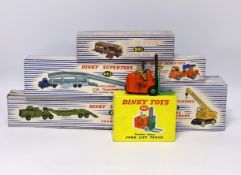 Six boxed Dinky Toys Including; a Pullmore Car Transporter with ramp (982), Mighty Antarctic Tank
