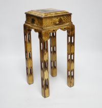 A Chinoiserie japanned stand, 32.5cm high